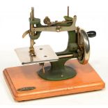 AE L GRAIN, NOTTINGHAM 1950S SEWING MACHINE, WITH INSTRUCTIONS