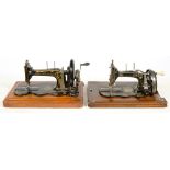 A SINGER 1890S, SERIAL 1983364, HAND CRANKED MACHINE WITH FIDDLE BASE AND ANOTHER, SERIAL 1323123,