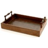 AN EARLY VICTORIAN ROSEWOOD TRAY WITH UPSTANDING TURNED HANDLES, 26.5CM L