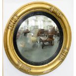 A WILLIAM IV GILTWOOD AND COMPOSITION CONVEX MIRROR, 58CM D.Provenance: DAVID GIBBONS WOODBRIDGE