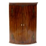 A VICTORIAN MAHOGANY BOW FRONTED CORNER CUPBOARD, 98CM H X 70CM W