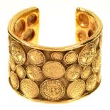 A CHANEL BRASS COIN CUFF BRACELET, INSCRIBED INSIDE CHANEL, 28, MADE IN FRANCE++IN GOOD CONDITION
