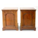 A PAIR OF VICTORIAN MAHOGANY CUPBOARDS WITH PANELLED DOORS, FORMERLY THE ENDS OF A SIDEBOARD, 88CM