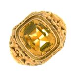 A CITRINE SIGNET RING IN GOLD, WITH CHASED SHOULDERS, UNMARKED, 8.5G, SIZE X½++LIGHT WEAR CONSISTENT