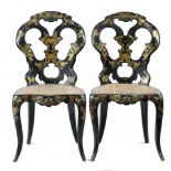 A PAIR OF VICTORIAN PAPIER MÂCHÉ CHAIRS, C1846, decorated in polychrome and gilt, caned seat, 84cm