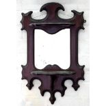 AN EDWARDIAN CARVED MAHOGANY MIRROR WITH BEVELLED PLATE, 58 X 38CM