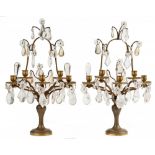 A PAIR OF FRENCH ORMOLU AND ROCK CRYSTAL CANDELABRA, ROCK CRYSTAL 18TH C, THE ORMOLU LATER, of