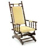 A STAINED AND TURNED BEECH AMERICAN ROCKING CHAIR, EARLY 20TH C