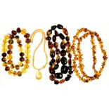 AN AMBER BEAD NECKLACE AND TWO OTHERS, 520G++LIGHT WEAR CONSISTENT WITH AGE