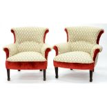 A PAIR OF VICTORIAN ARMCHAIRS, LATER UPHOLSTERED IN BUTTON BACK FABRIC, BELIEVED TO BE FROM THE