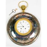 A FRENCH EPNS WALL CLOCK WITH ENAMEL DIAL AND ORMOLU CAVETTO, BRASS FINIAL AND SUSPENSION RING, 30CM