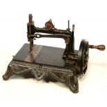 A BEAUMONT EARLY 1880S, SERIAL 57925 CAST IRON ANTIQUE SWEING MACHINE, LOCKABLE WOODEN CASE AND
