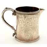 A VICTORIAN SILVER MUG, LATER ADAPTED AS A CREAM JUG, 8 CM H, MARKS OFFICIALLY CANCELLED AT LONDON