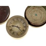 A VICTORIAN PLATED BRASS TRAVELLING ALARM TIMEPIECE OF CYLINDRICAL FORM WITH SILVERED DIAL AND BLUED