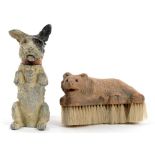 A COLD PAINTED SPELTER TABLE LIGHTER IN THE FORM OF A BEGGING TERRIER, 14CM H, C1930 AND A SWISS