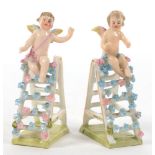 A PAIR OF GERMAN PORCELAIN MINIATURE FIGURES OF PUTTO ON A STEP LADDER, 9CM H, LATE 19TH C