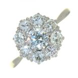 AN OLD CUT DIAMOND CLUSTER RING, OF FLORAL DESIGN, IN PLATINUM, MARKED PLATINUM, 3G, SIZE K++LIGHT