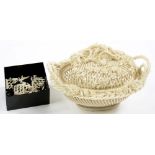 AN OVAL BELLEEK THREE STRAND BASKET AND COVER, 22CM L, COVER BROKEN