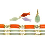 TWO CHINESE JADE BRACELETS IN 14CT GOLD, A CHINESE ORANGE JADE BRACELET IN 14CT GOLD, A JADE AND