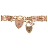 A 9CT GOLD BRACELET WITH TWO PADLOCK CLASPS, 21.5G++LIGHT WEAR CONSISTENT WITH AGE