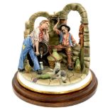 A CAPO DI MONTE GROUP OF A CELLARMAN AND GUEST, 30CM H EXCLUDING STAND, PAINTED MARKS, C1984