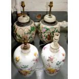 A PAIR OF PORCELAIN TABLE LAMPS DECORATED WITH FLOWERS, EARLY 20TH C, 30CM H