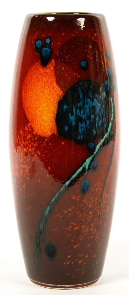 AN ALAN CLARKE EARTHENWARE VASE, DECORATED PREDOMINANTLY IN HIGH TEMPERATURE RED, ORANGE AND BLUE