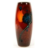 AN ALAN CLARKE EARTHENWARE VASE, DECORATED PREDOMINANTLY IN HIGH TEMPERATURE RED, ORANGE AND BLUE