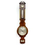 A VICTORIAN BRASS MOUNTED MAHOGANY BAROMETER, WITH CYLINDRICAL PILLARS AND ALCOHOL THERMOMETER, 99CM