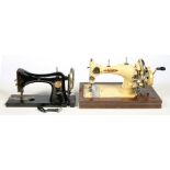 A TAILOR BIRD 1950S SEWING MACHINE, SERIAL 21812, LIGHTWEIGHT, PORTABLE HAND CRANK MACHINE, MADE