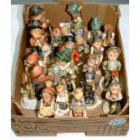 A COLLECTION OF GOEBEL FIGURES OF CHILDREN, DESIGNED BY M. J. HUMMEL