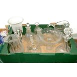 AN EDWARDIAN FACETED GLASS TAZZE, FOUR VARIOUS DECANTERS AND THREE JUGS