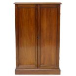 A MAHOGANY CUPBOARD ENCLOSED BY A PAIR OF PANELLED DOORS, 84CM L, EARLY 20TH C