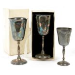 A PAIR OF ELIZABETH II SILVER GOBLETS, 17.5 CM H, BIRMINGHAM 1973, CASED AND ONE OTHER, 16 CM H,