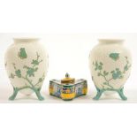A PAIR OF STAFFORDSHIRE BONE CHINA EGG SHAPED BASKET MOULDED VASES, DECORATED IN RELIEF WITH