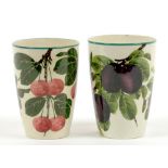 TWO WEMYSS WARE BEAKERS, ONE PAINTED WITH CHERRIES, THE OTHER PLUMS, 11.5CM H AND CIRCA, IMPRESSED