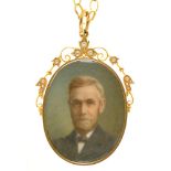 A VICTORIAN LOCKET IN GOLD MARKED 15CT, SET WITH SPLIT PEARLS, INSET WITH ENAMEL PORTRAIT