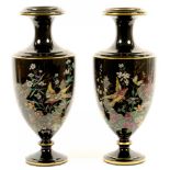 A PAIR OF VICTORIAN SHIELD SHAPED BLACK GLAZED RED EARTHENWARE VASES, PRINTED AND PAINTED WITH BIRDS