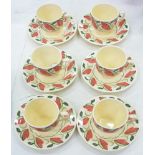 A SET OF SIX SUSIE COOPER EARTHENWARE BEECHWOOD PATTERN COFFEE CUPS AND SAUCERS, SAUCERS 12CM D,