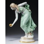 A MEISSEN FIGURE OF A GIRL PLAYING BOWLS, KUGELSPIELERIN, MODELLED BY WALTER SCHOTT, C1900, 38cm