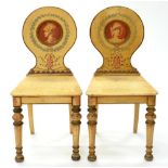 A PAIR OF PAINTED HALL CHAIRS, THE ROUND BACK PAINTED EN GRISAILLE WITH PORTRAIT MEDALLIONS OF