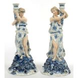 A PAIR OF GERMAN FLORAL ENCRUSTED BLUE AND GILT CLASSICAL MAIDEN FIGURAL STANDS, 37CM H, C1900