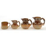 THREE 19TH C SALTGLAZED BROWN STONEWARE HUNTING JUGS AND A SIMILAR MUG, LARGEST JUG 17CM H, UNMARKED