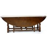 AN OAK WAKE TABLE IN IRISH 18TH C STYLE, 221 X 146CM