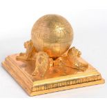 BRITISH EMPIRE EXHIBITION, WEMBLEY 1924. A COMMEMORATIVE GOLD PLATED GLOBE SHAPED TRINKET BOX ON