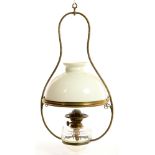 A LATE VICTORIAN BRASS ROPE FRAMED HANGING OIL LAMP WITH CUT GLASS FOUNT AND A WHITE GLASS SHADE,