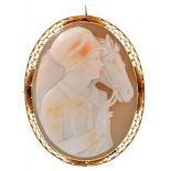 A SHELL CAMEO BROOCH OF A HORSE AND RIDER, IN GOLD, UNMARKED, 4.5 X 3.5 CM APPROX++GOOD CONDITION