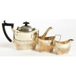 A VICTORIAN SILVER THREE PIECE TEA SERVICE, CHESTER 1899, 19OZS