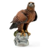 A CHRISTOPHER HOLT AND CO PAINTED RESIN SCULPTURE OF AN EAGLE, 32CM H