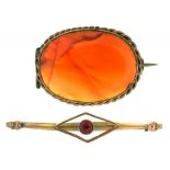 AN ART DECO PASTE SET BAR BROOCH IN GOLD MARKED 9CT AND A VICTORIAN AGATE BROOCH IN GOLD,